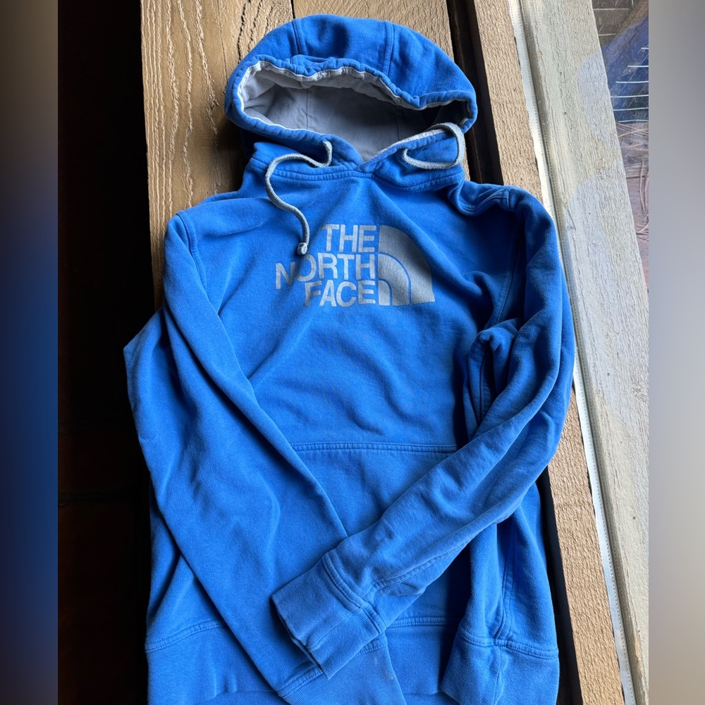 The North Face men’s blue and grey hoodie